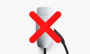 Tesla follows Apple in dropping chargers