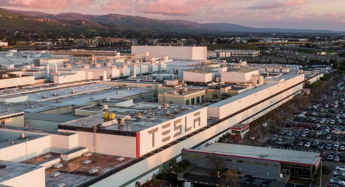 Tesla will let go of as many as 10,000 employees