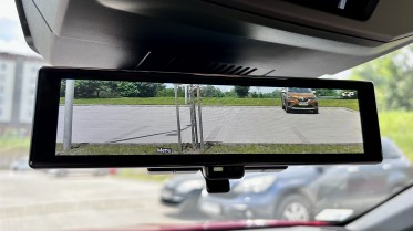 The rear-view mirror camera zooms way too much, which effectively makes it unusable.