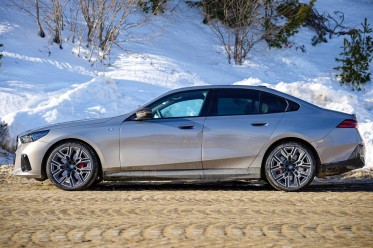 The side profile of the i5 carries BMW heritage features.