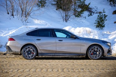 The side profile of the i5 carries BMW heritage features.