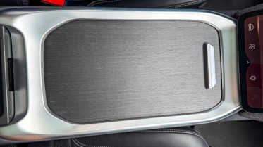 The center console has a magical decklid.