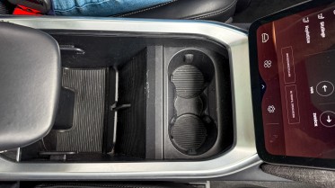 The center console has a magical decklid.