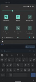 A very early version of Android 12 running on a OnePlus 9 Pro